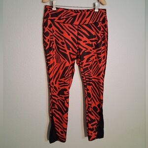 Red And Black Printed Leggings With Mesh Panel At Ankles Large